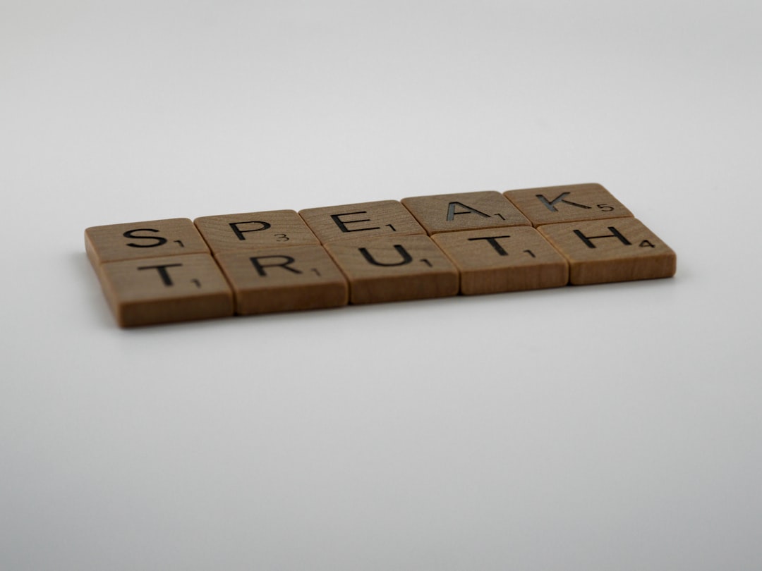 brown wooden blocks on white surface, scrabble, scrabble pieces, lettering, letters, wood, scrabble tiles, white background, words, type, typography, design, layout, speak truth, truth, tell the truth, honesty, reliable, integrity, no lies,<p></figure>