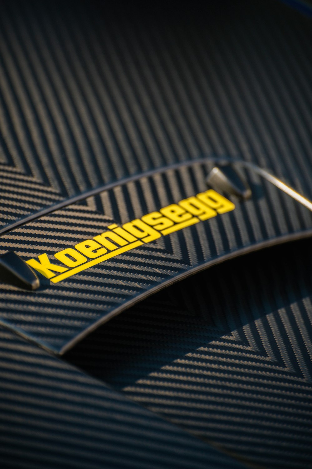 a close up of a car's emblem on a vehicle