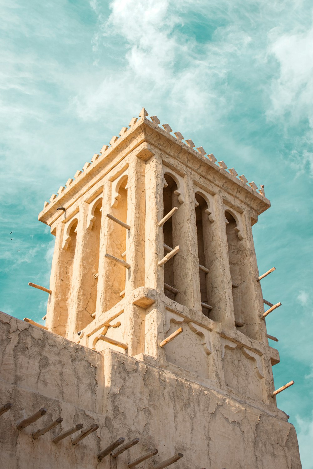 white concrete building under blue sky during daytime