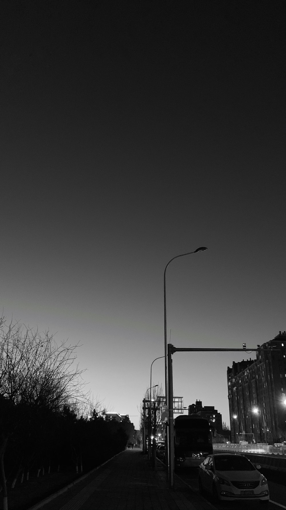 grayscale photo of street light