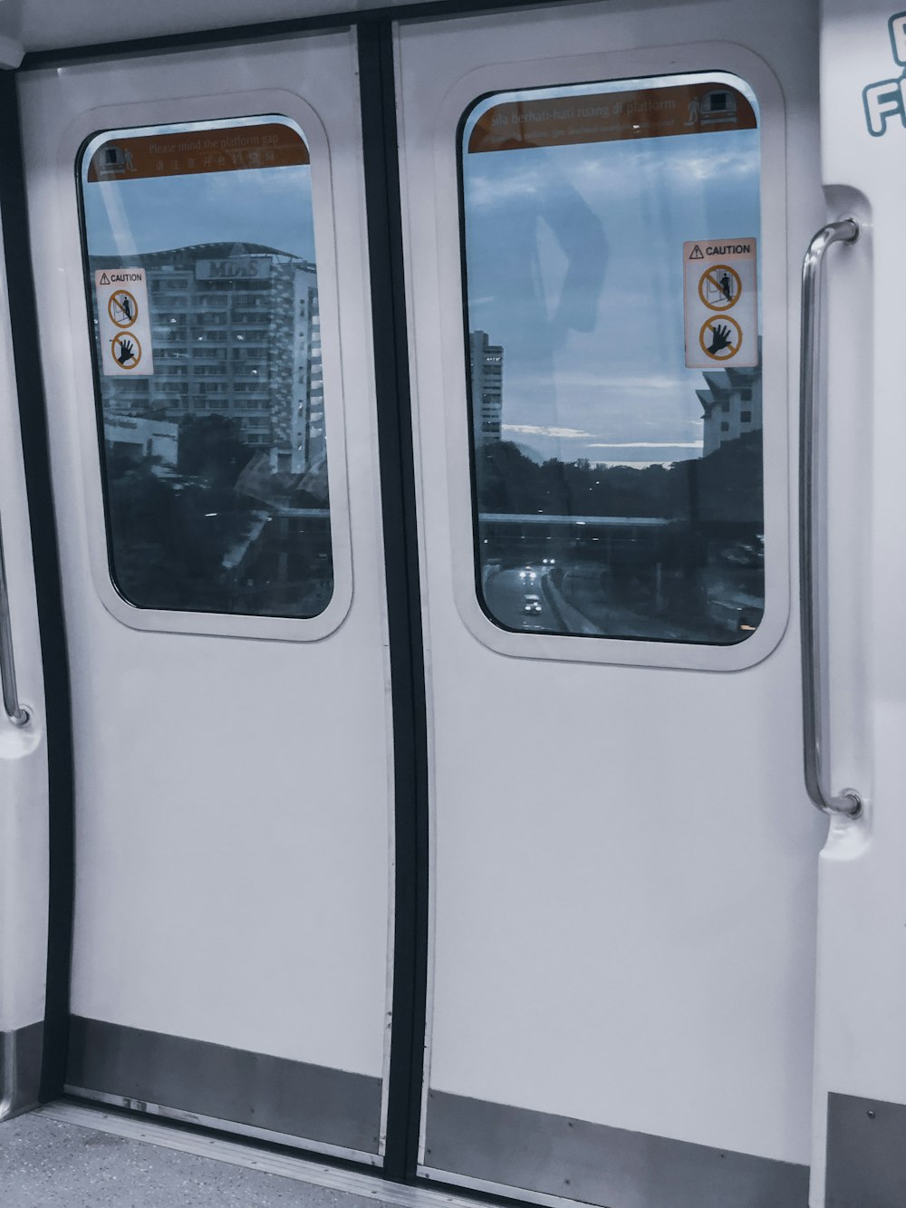 white and black train door