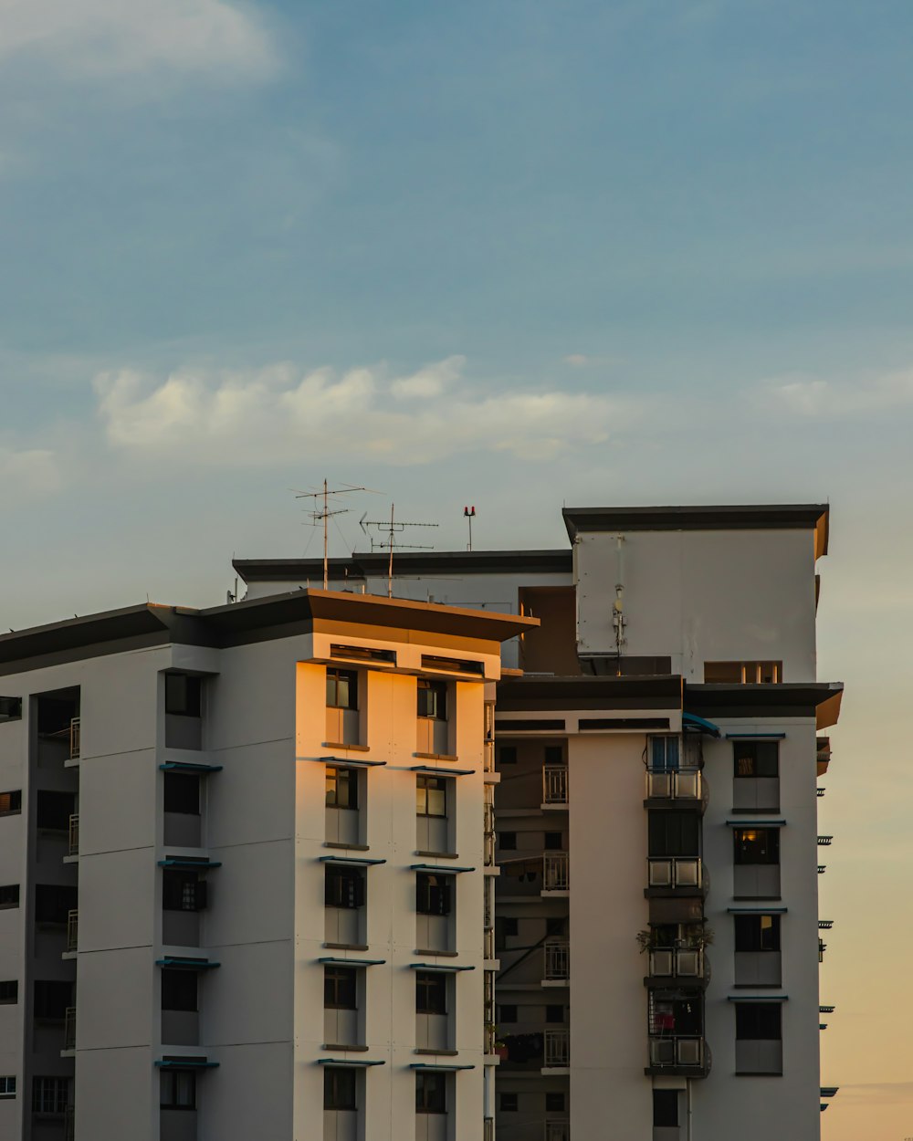 white and brown concrete building under blue sky during daytime