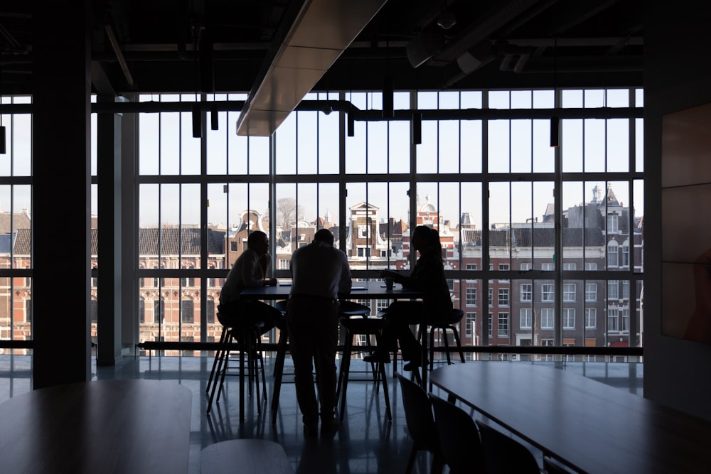 people sitting on chair inside building