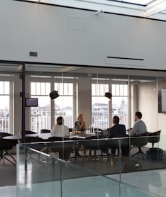 people sitting on chair inside building