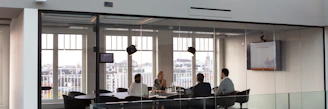 people sitting on chair inside building