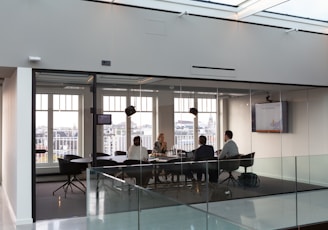 people sitting on chair inside building