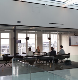 people sitting on chair inside building