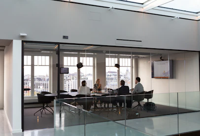 people sitting on chair inside building