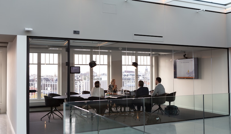 people sitting on chair inside building