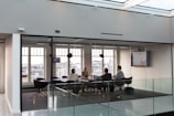 people sitting on chair inside building