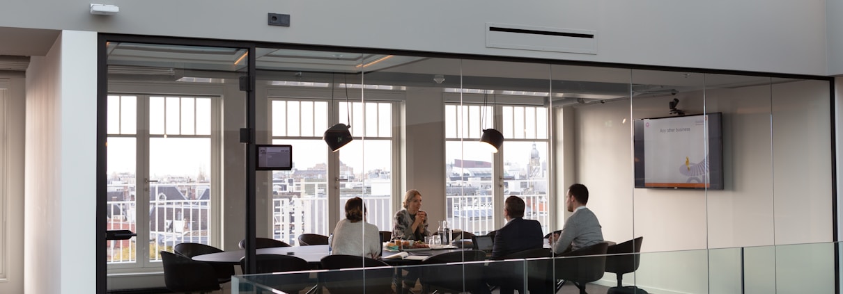 people sitting on chair inside building