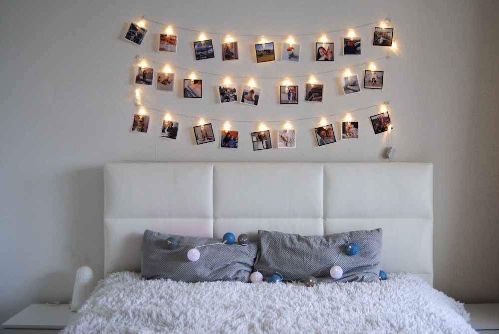 gray and white throw pillows on gray couch