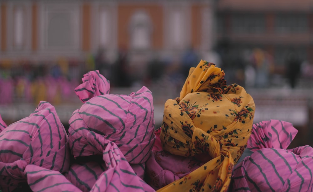 pink and yellow floral textile