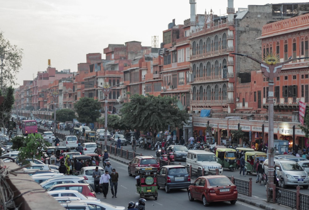 cars parked on street near buildings during daytime