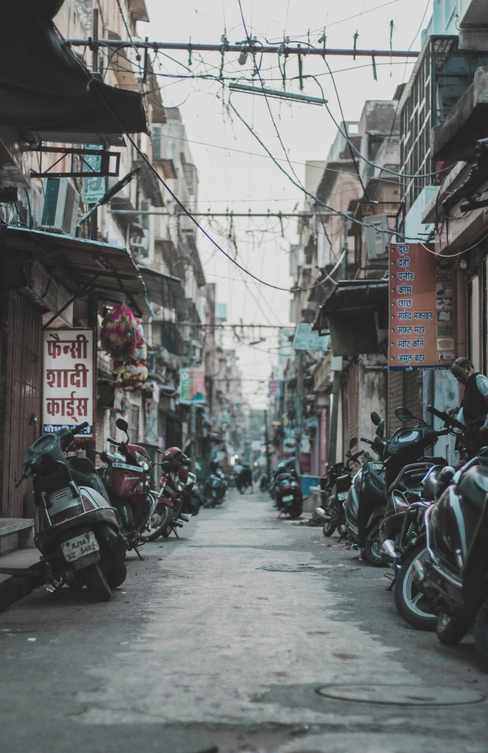 parked motorcycles on street during daytime