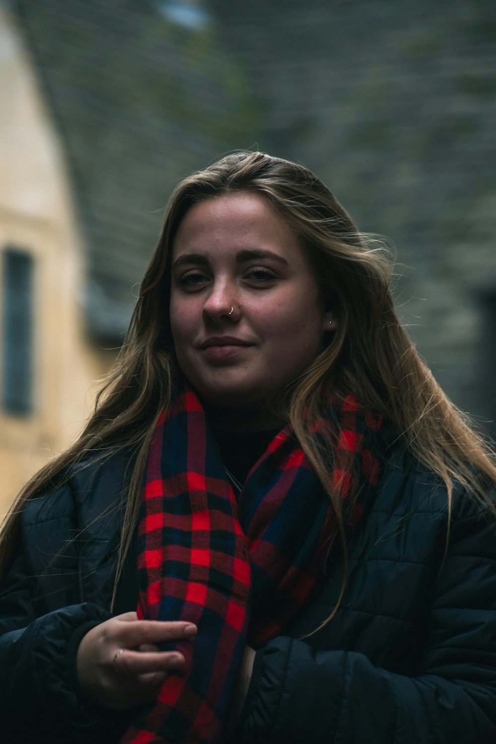 woman in black jacket smiling