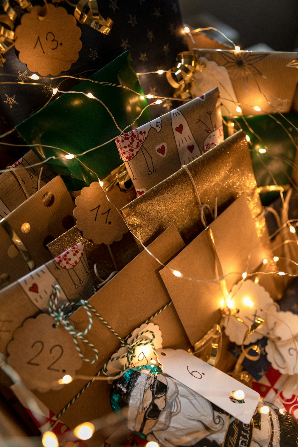 brown gift boxes with white string lights