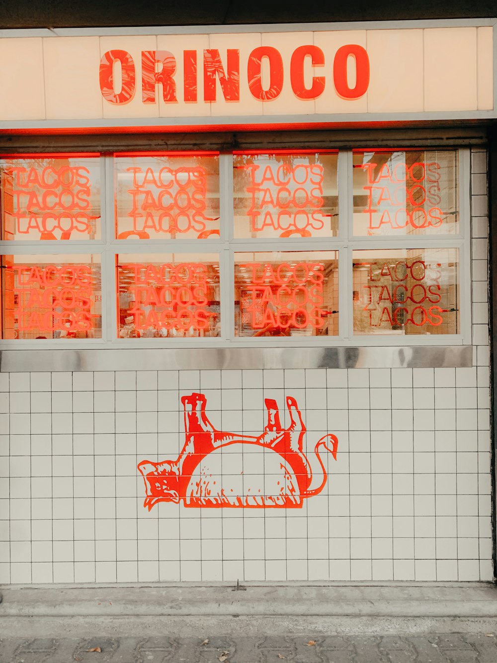 red and white coca cola signage