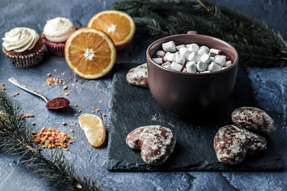 A cozy winter scene featuring gourmet hot chocolate and popcorn.