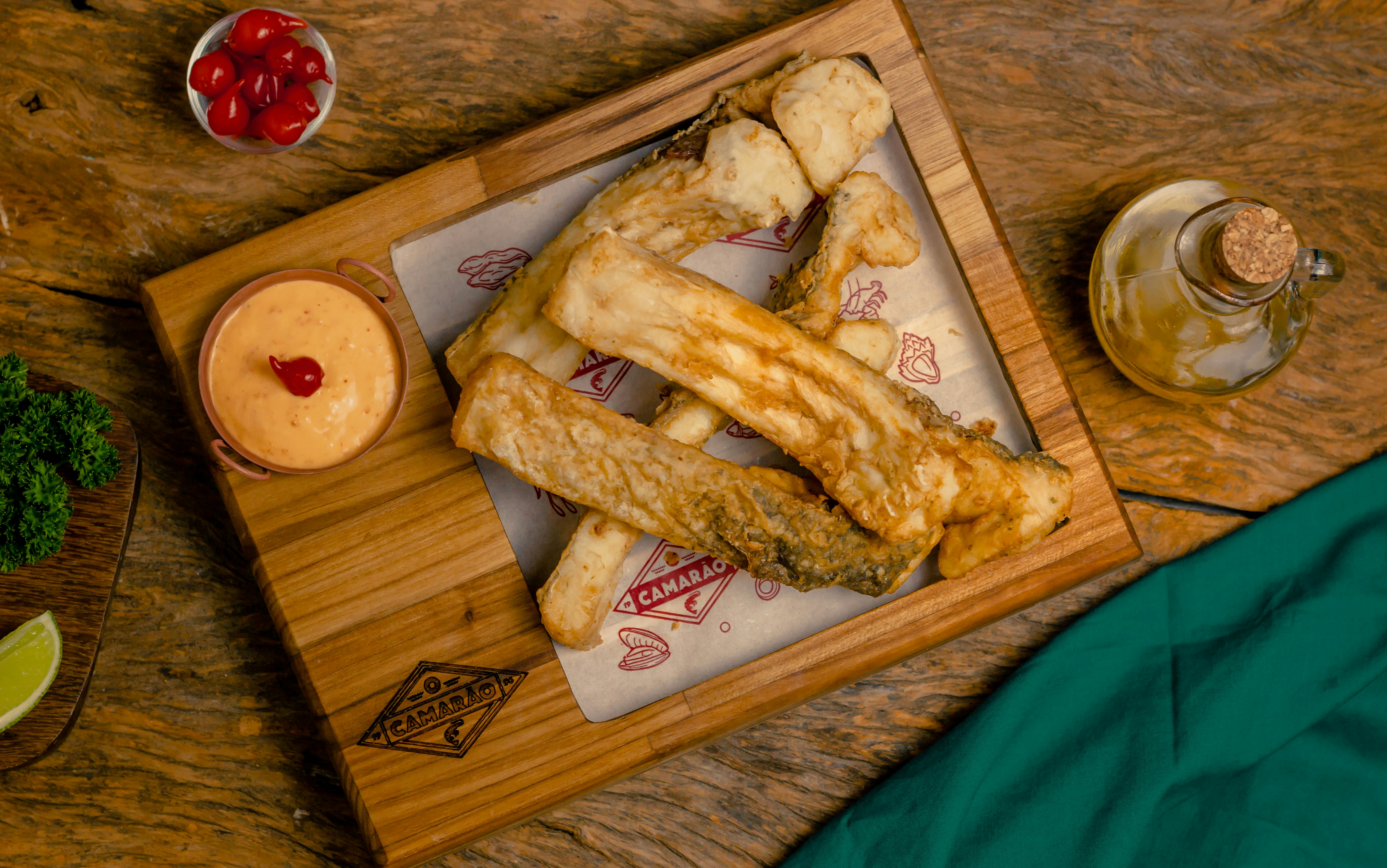 fried chicken on brown wooden chopping board