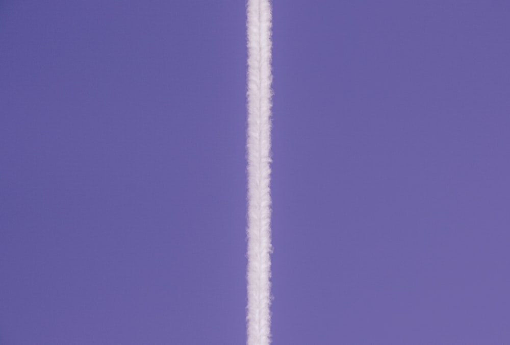 white string on blue background