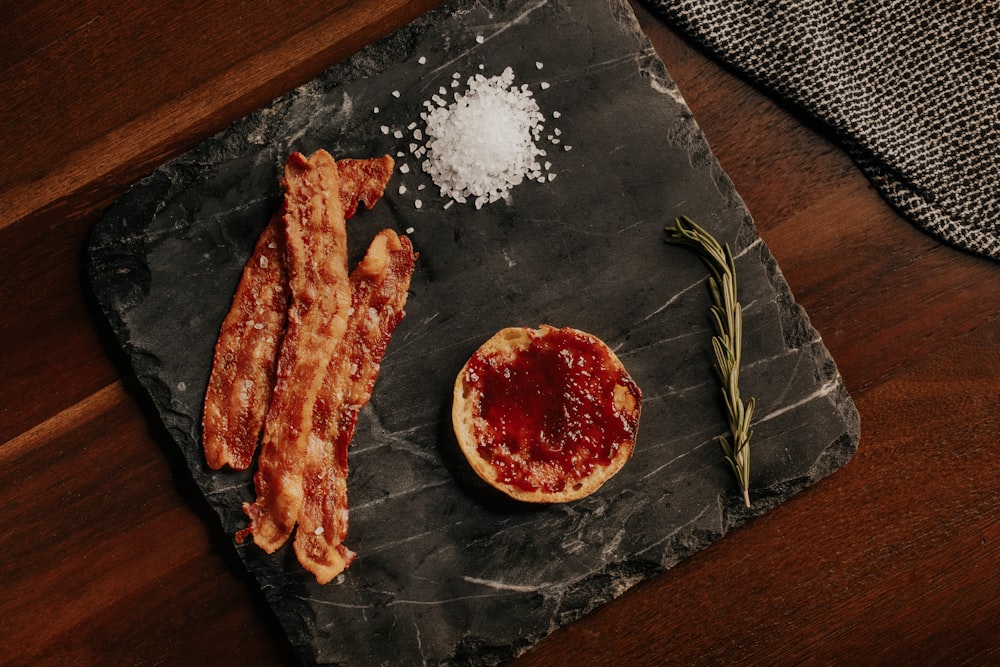 raw meat on black rectangular plate