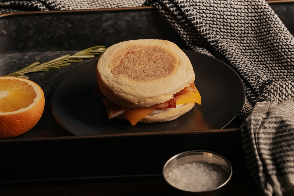 burger on black ceramic plate