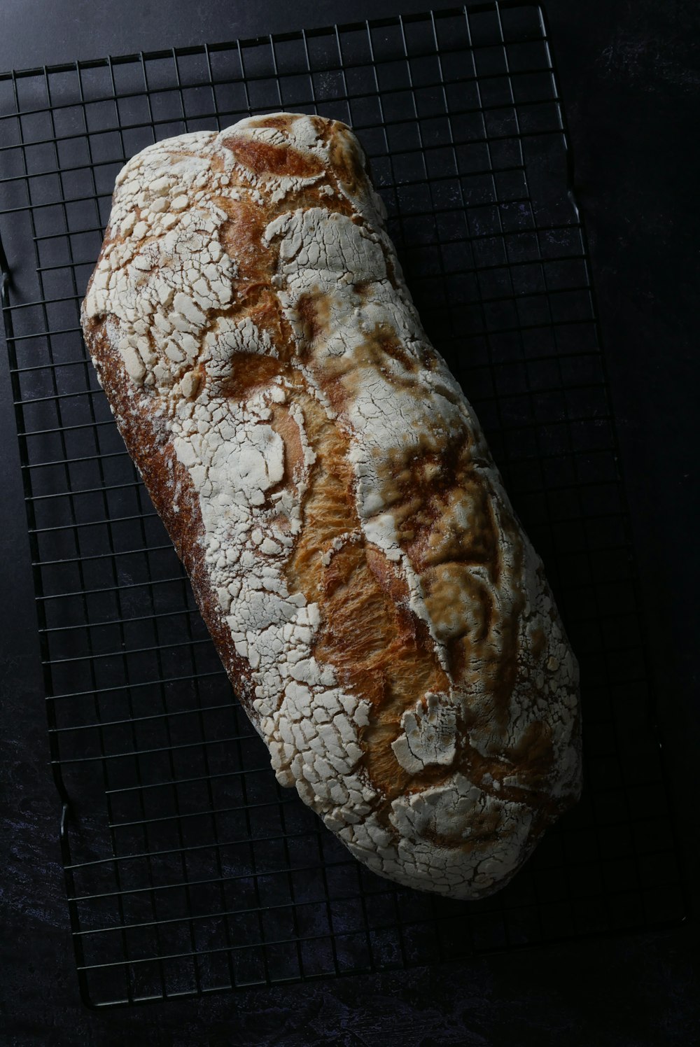 brown bread on black metal grill