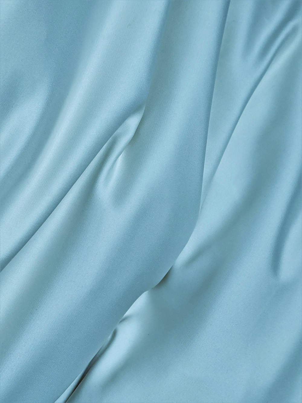 blue textile in close up photography