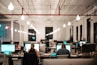 people sitting on chair in front of computer