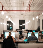 people sitting on chair in front of computer