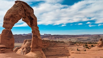 brown rock formation under blue sky during daytime