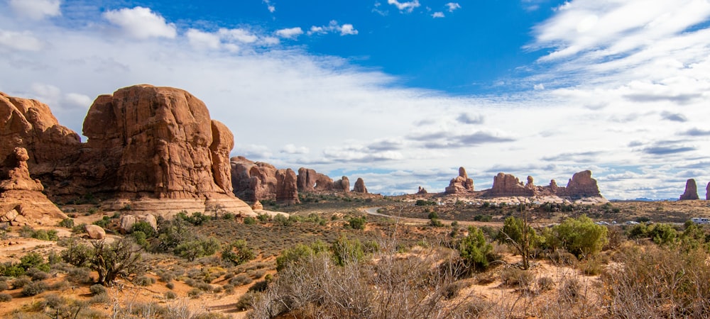 brown rock formation under blue sky during daytime