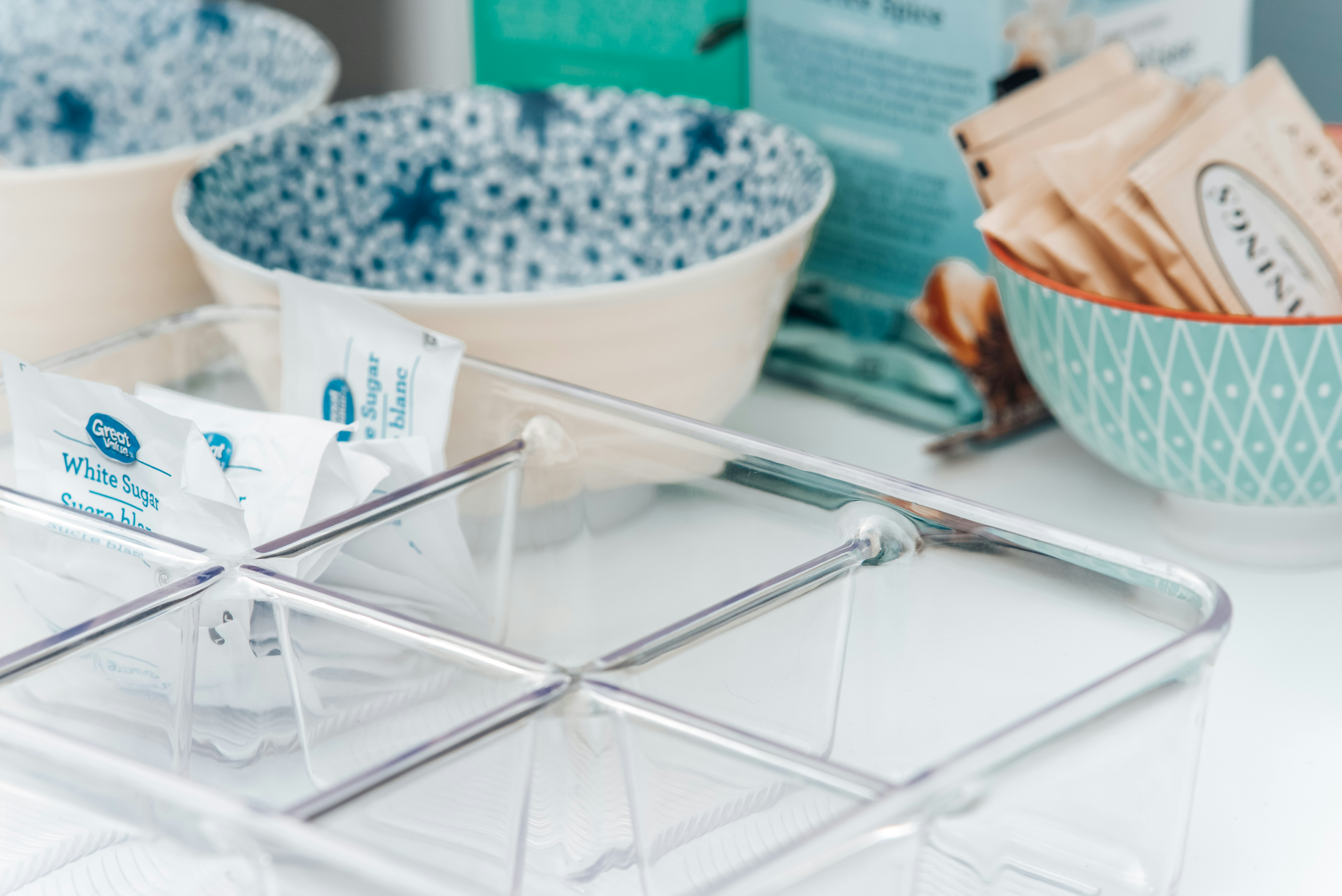 white ceramic bowl on stainless steel rack