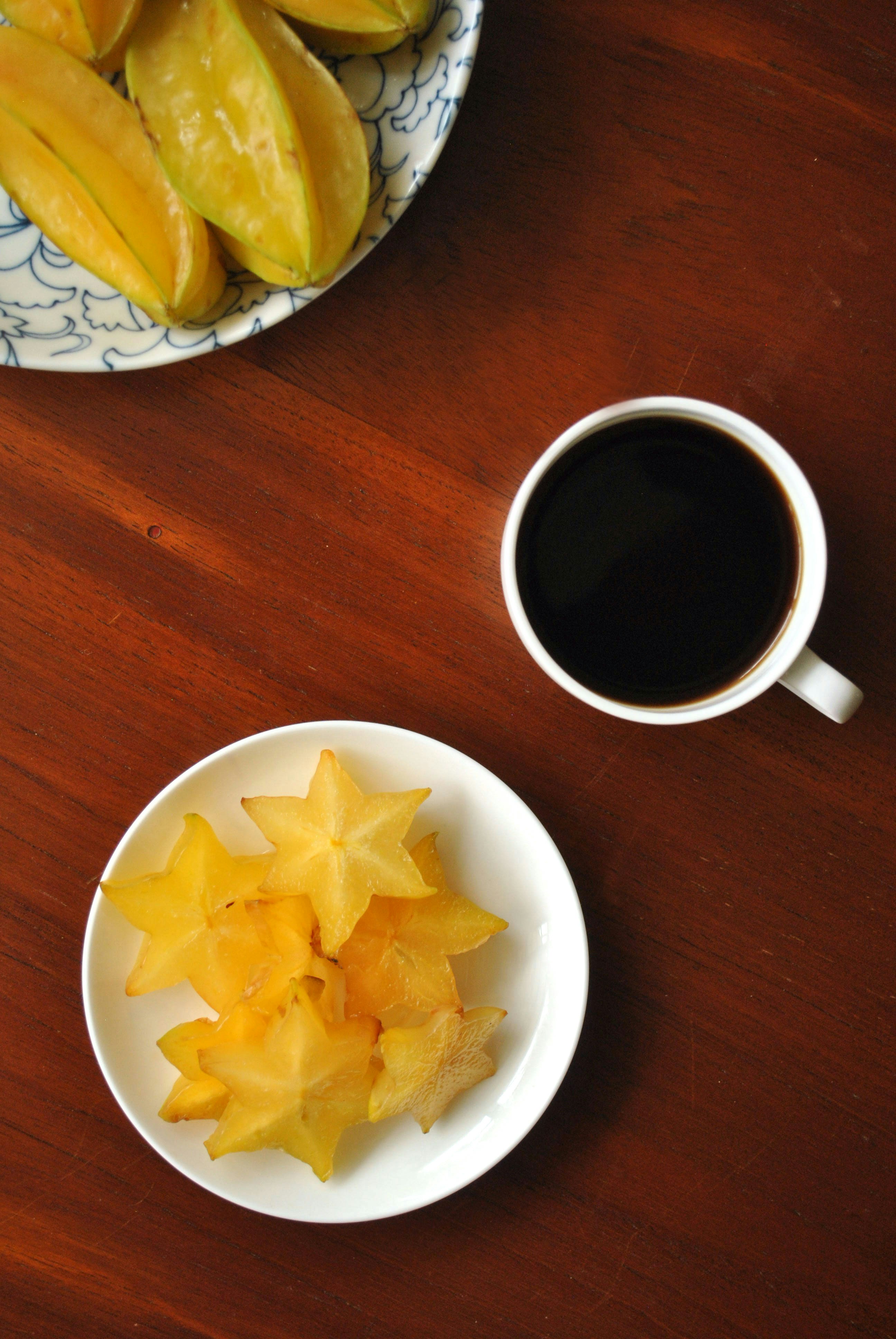 white ceramic mug with black liquid