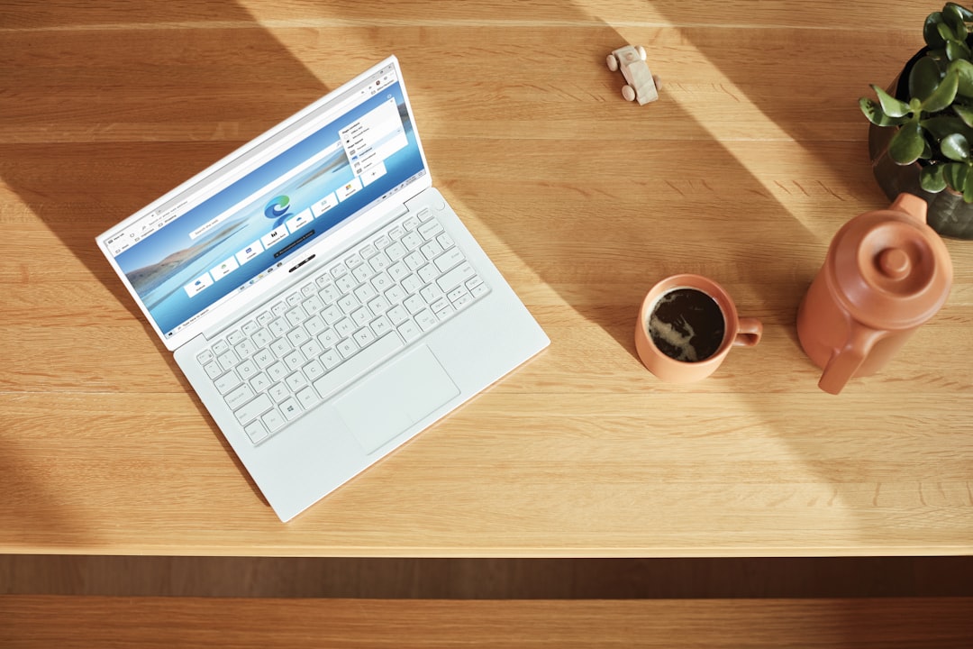 Surface laptop on brown wooden table