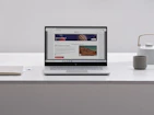 Open laptop displaying a blog post about programming RC sailing yachts with 3D printed parts