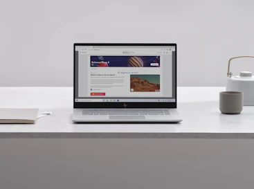 A modern academic journal website open on a laptop displaying a freshly published article.