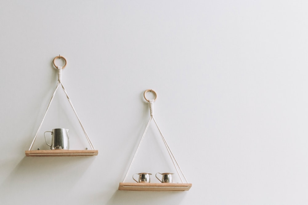 white and brown wooden 2 tier rack