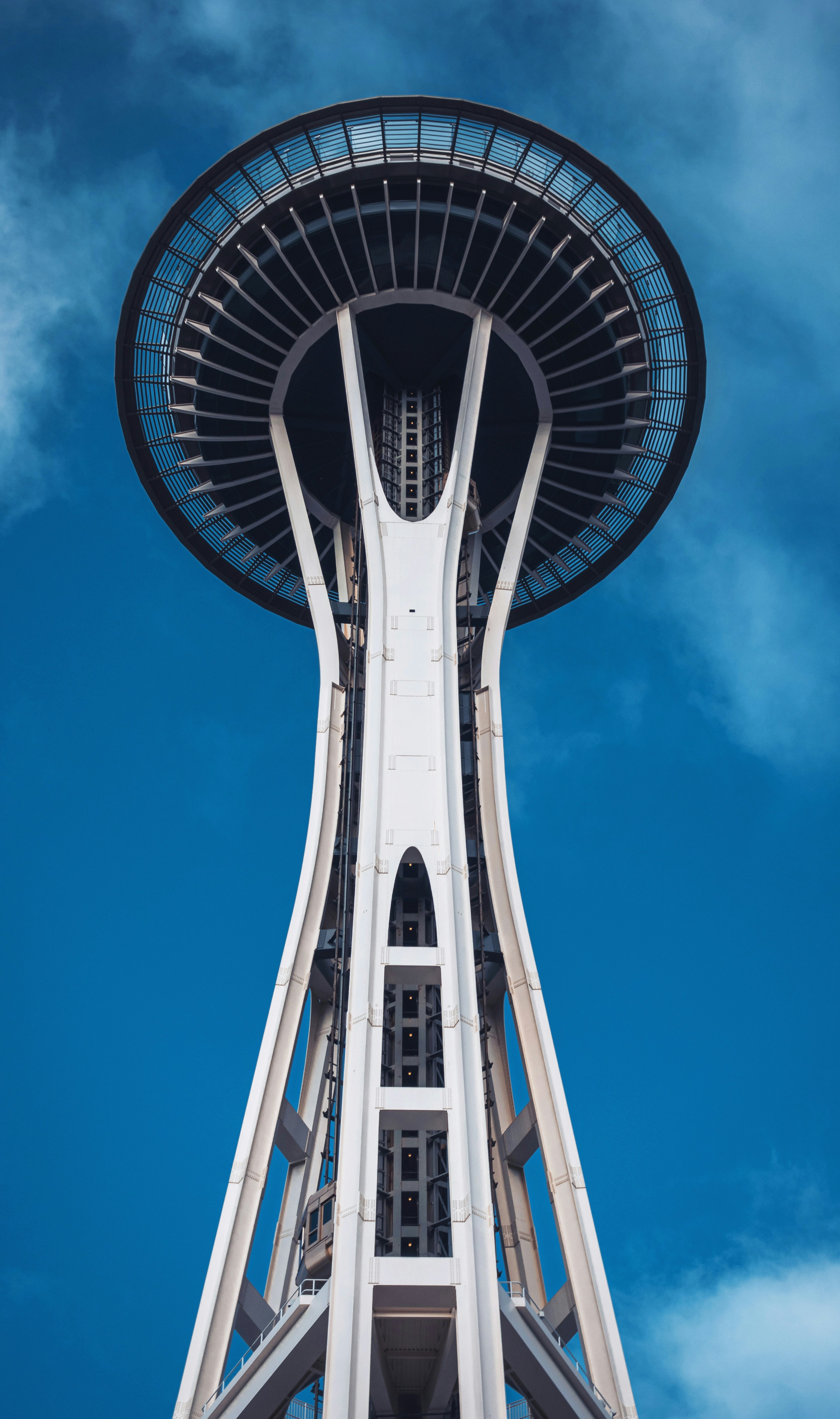 white and black tower under blue sky