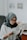 woman in white hijab and black framed eyeglasses