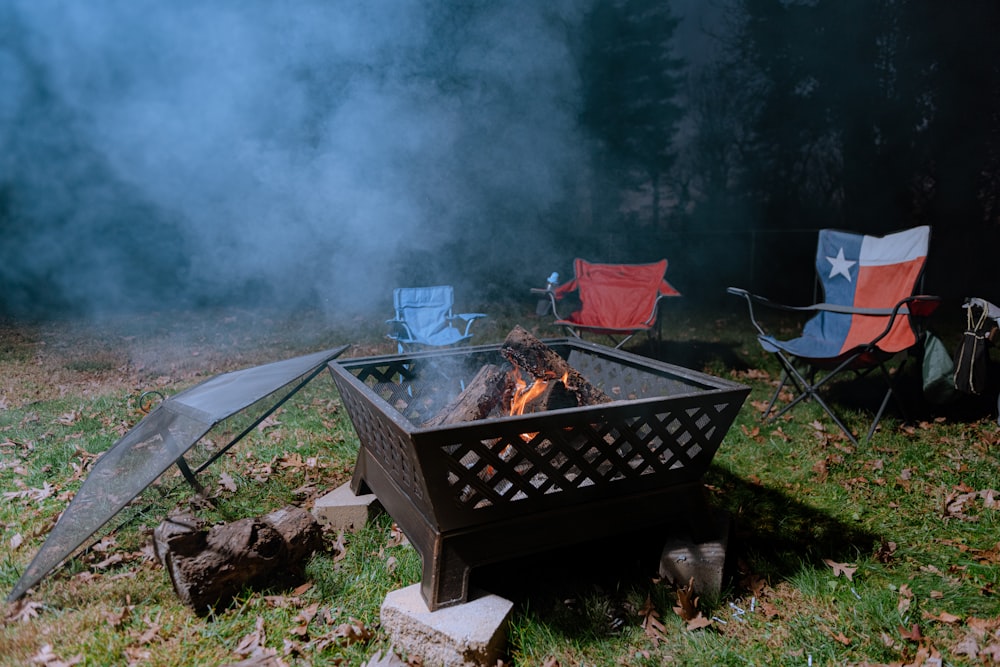 brown fire pit with fire