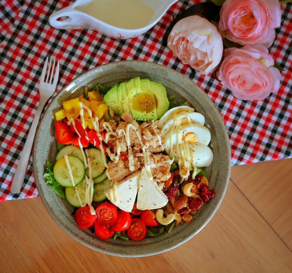 sliced vegetables on brown ceramic bowl