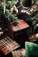green christmas tree with red and white plaid textile