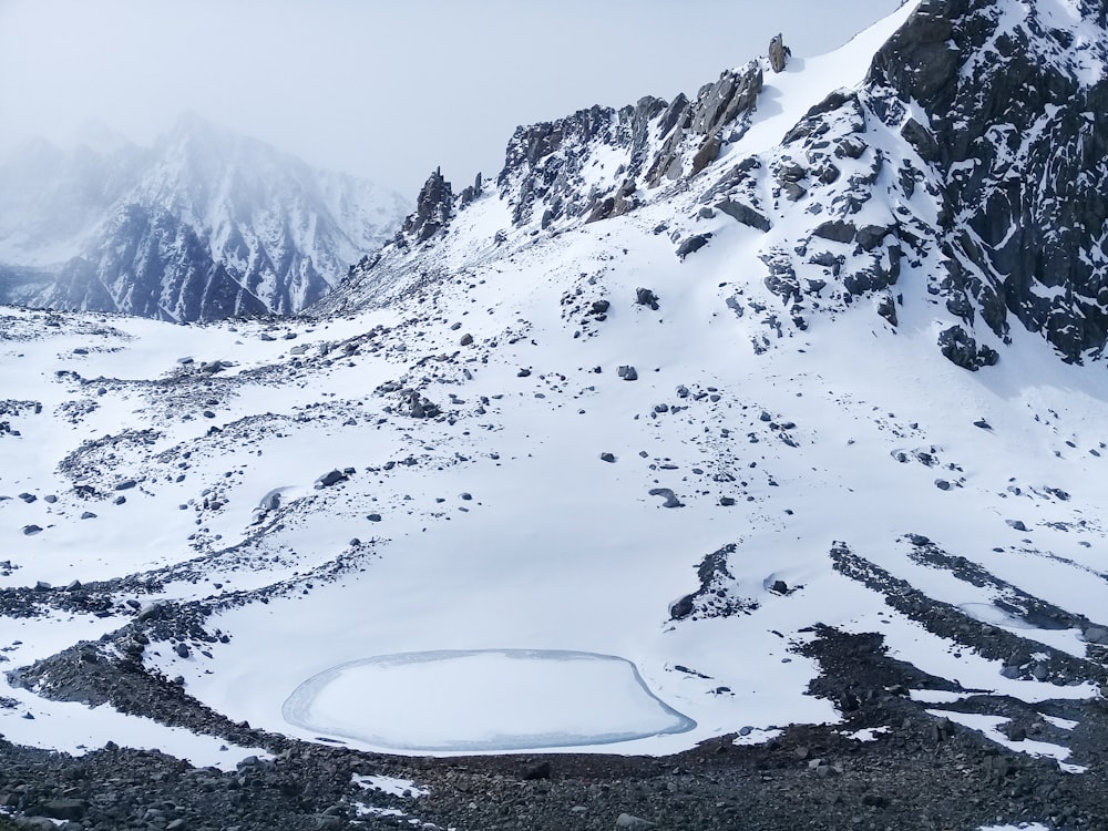 snow covered mountain during daytime