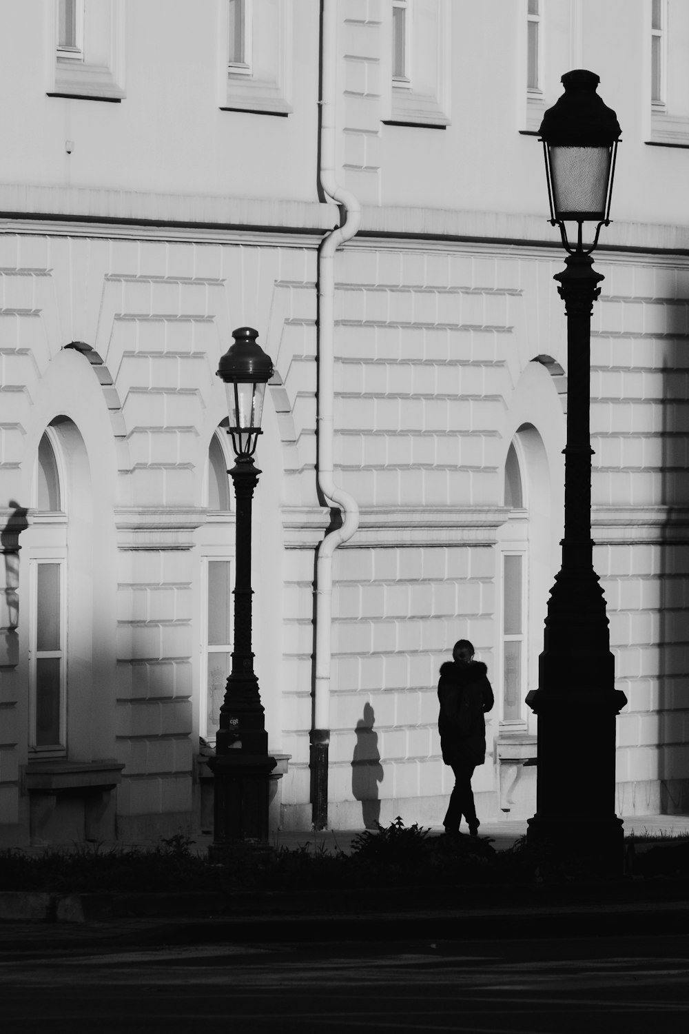 grayscale photo of people walking on street