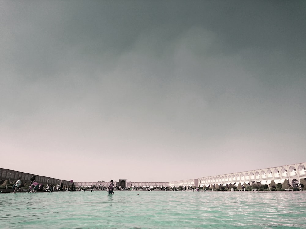 gray concrete bridge over water