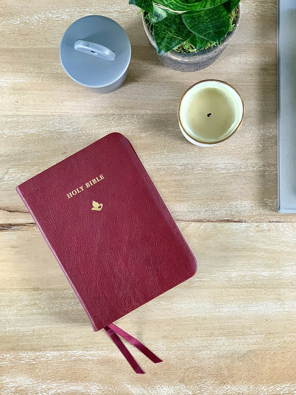 red book on brown wooden table