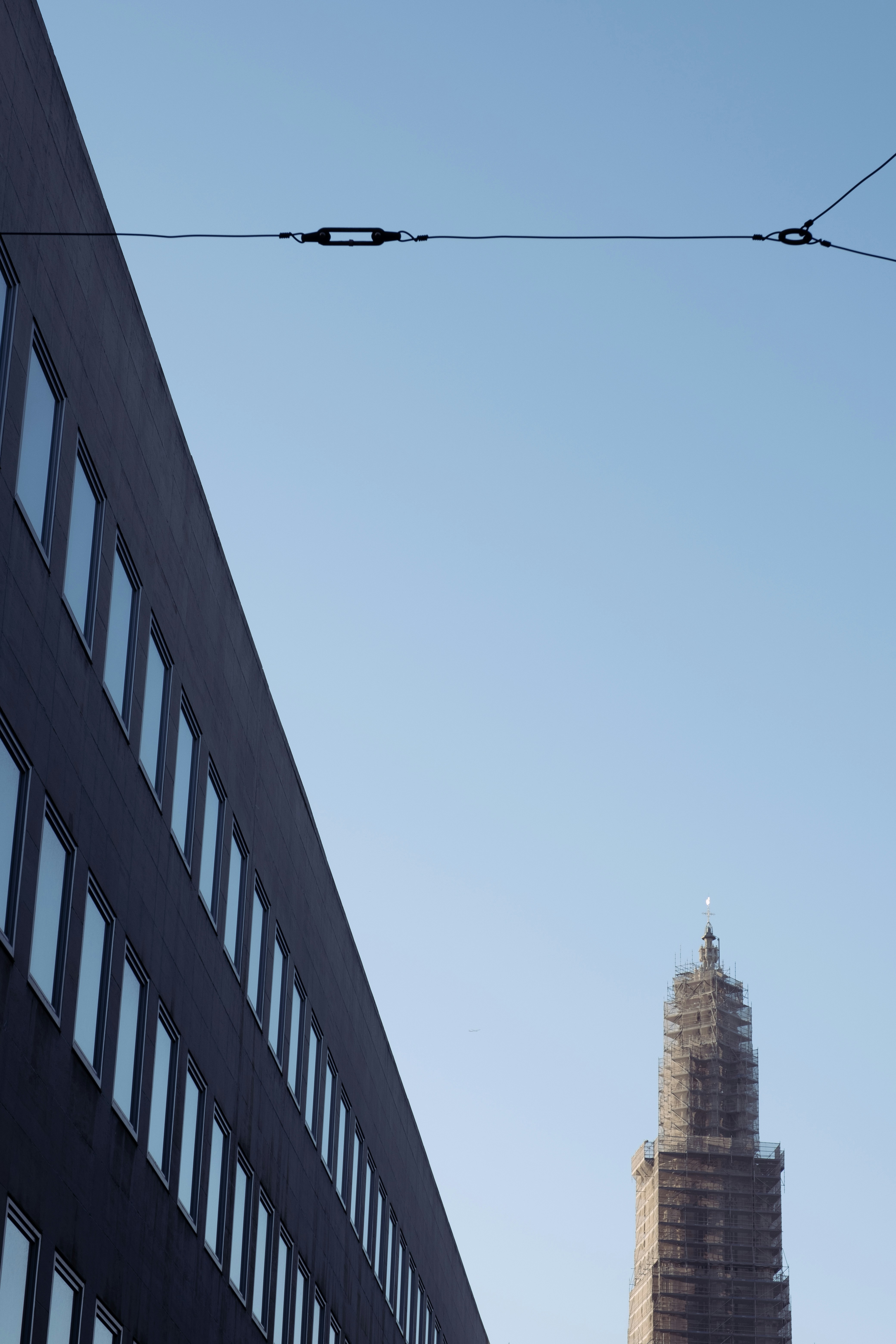 brown concrete building under blue sky during daytime