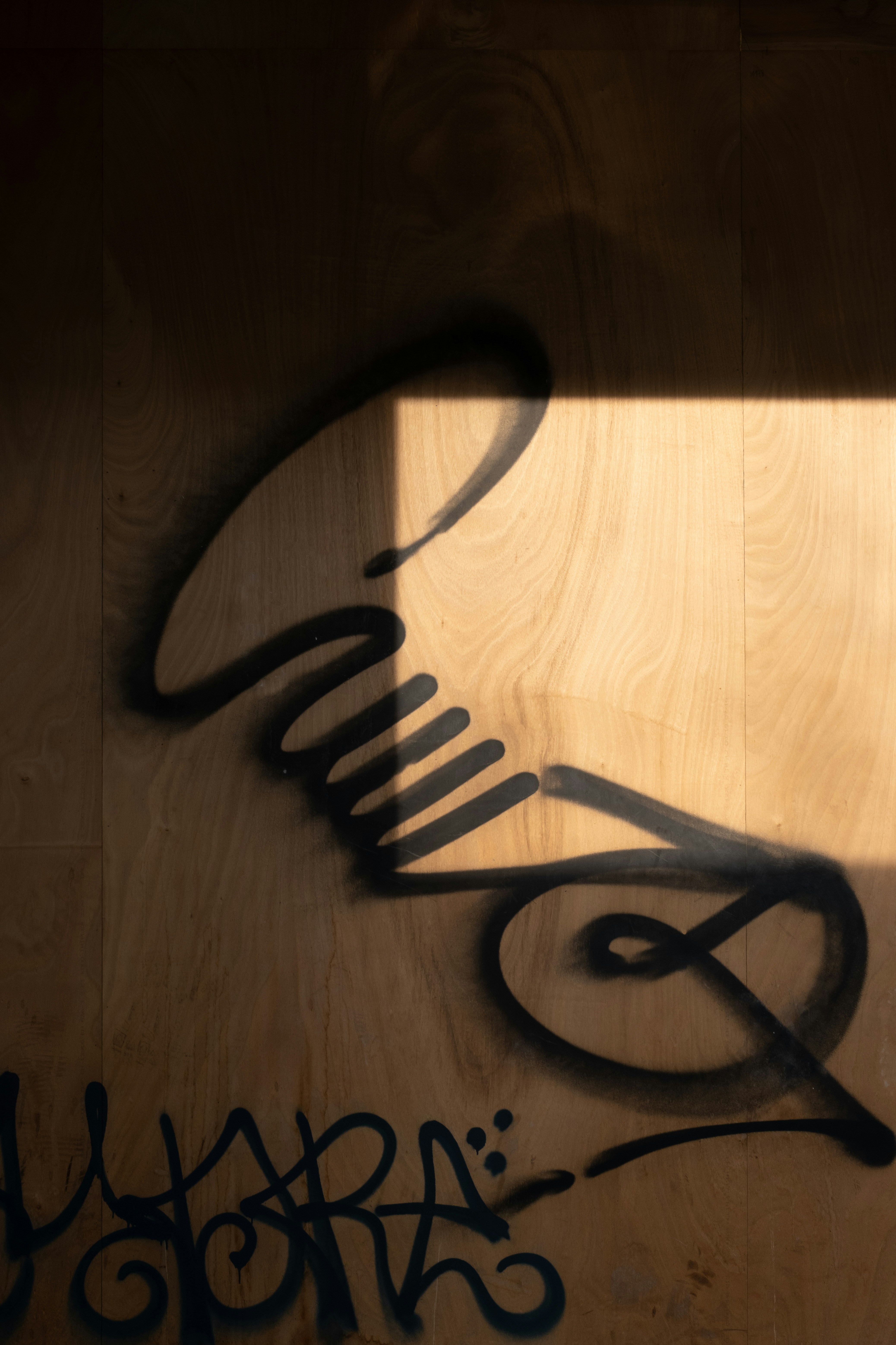 black metal frame on brown wooden floor